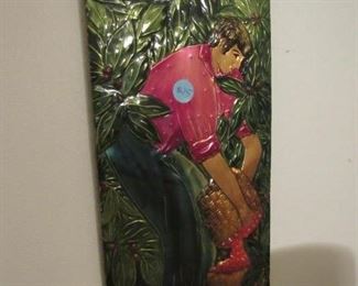 Embossed art on metal
