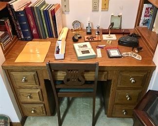 VINTAGE BOOKS AND MUSIC LYRE CHAIR. DESK NOT FOR SALE AND STAYS IN THE HOME.