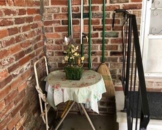 matal table, step stool, mops, brooms