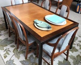Dining table with eight chairs, two additional leaves, and pads. Originally purchased at Klingman's.
