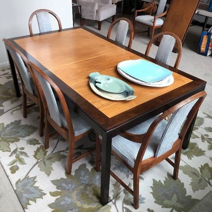 Dining table with eight chairs, two additional leaves, and pads.  Originally purchased at Klingman's.