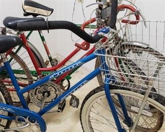 Front 1989 Schwinn Cruiser, red Varsity, green All pro