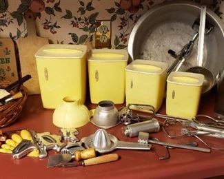 Vintage kitchen canisters and utensils with aluminum pan