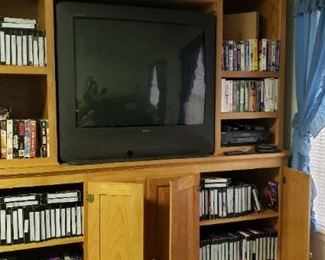 Large entertainment ctr, RCA TV and VHS tapes and player