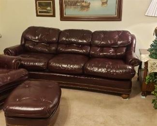 Leather couch, chair and ottoman, mahogany colored