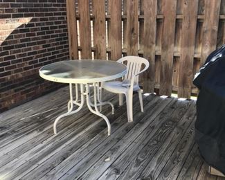 Patio tables, chairs and grill