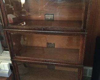GLOBE WERNICKE BARRISTER WITH 3 - 14” HIGH SECTIONS WITH BEVELED GLASS DOORS  AND A BOTTOM DRAWER
