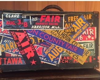 Suitcase with State Fair Bumper Stickers