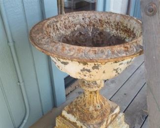 Antique iron urn planter
