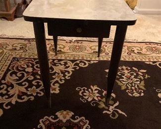 End table with laminate top and drawer $25