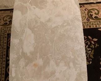 End table with laminate top and drawer $25