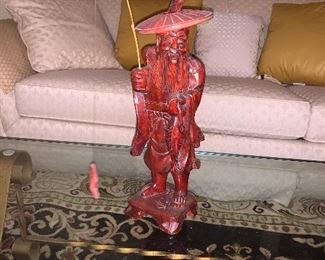 Asian fisherman with his catch $20