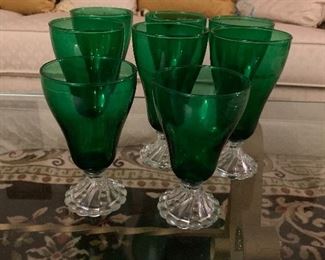 Two small and six large emerald colored glasses $8