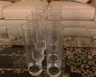 Set of eight large drinking glasses with Asian disk on front $12