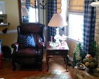 Red leather recliner, Queen Anne side table, crystal lamp, mission wall mirror and coat tree