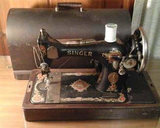 Antique Singer sewing machine with case and key