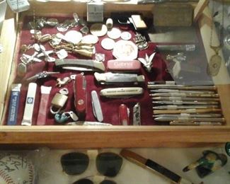 vintage pocket knives, writing implements, key chains, measuring tapes, coins and more