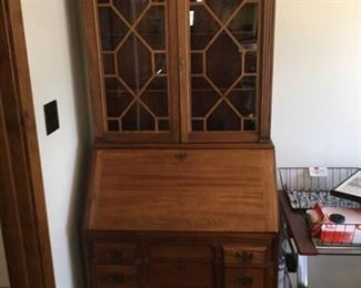 desk with curio cabinet