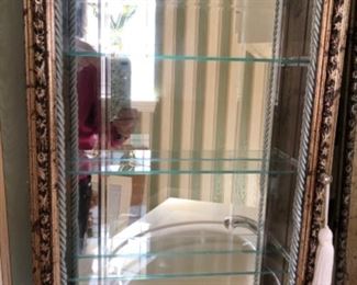 Mirrored hanging shelf