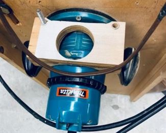 Router connected to table top 