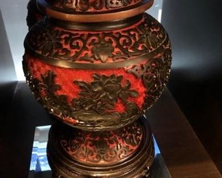 Pair of cinnabar vases on stands
