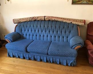 Couch in good shape with old area rug made in Belgium. 
