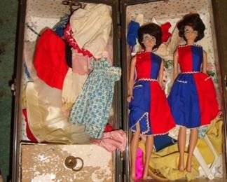 Vintage Barbie Dolls with some hand made clothing outfits.
