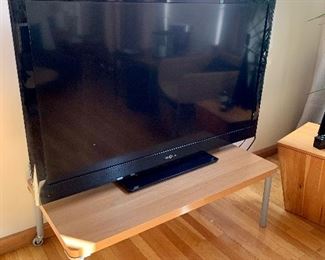 Insignia TV with MCM style table