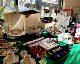 Table full of kitchen and host goodies