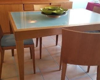 Another view of the dining table and chairs