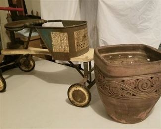 Vintage push cart and terracotta flower pot