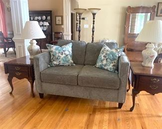 Loveseat in light gray upholstery, pair of matching Thomasville end tables