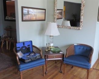 Pair of Cane Club Chairs, Drop leaf End Table, Crystal Lamp, Mirror, Print