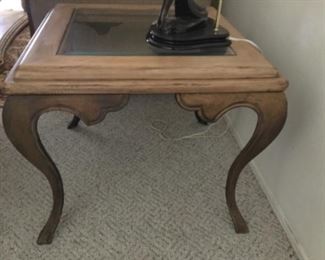 Second of two end tables shows lower detail