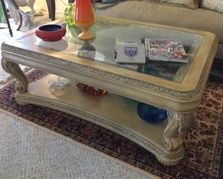 Large coffee table with classic charm and area rug