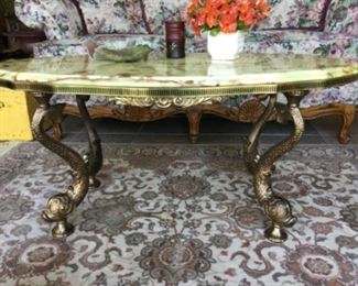 Dolphin legged coffee table