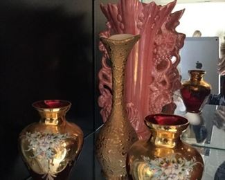 Heavily decorated vases