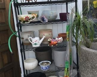 Shelf, pottery and porcelain pots, brass planters, etc.