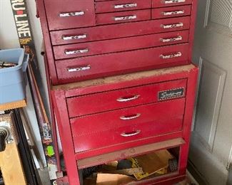 Snap On Tool chest with key on bottom and Mac tool chest on tap