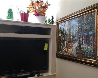 Two TV’s, lots of framed art including Marty Bell