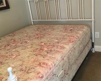 Queen bed and mattresses. White enameled iron ornate head and footboard