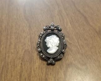 Antique black and silver cameo pendant/brooch.  Priced at $40 you can call/text 785-580-6698 anytime to set an appt to purchase this item.  Thank you!!