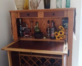 Drop Down Bar with Wine Storage & 2 Drawers. Glass Bottles & Stoneware Vases