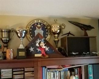 Many military collectibles, world traveler - retired USAF.