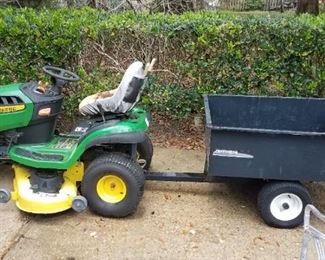 Clean, John Deere riding tractor / lawn mower with accessories. 104  hours, new battery.  Available for pre-sale @ $475.00