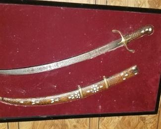 3-4 collectible fantasy  swords and more. 