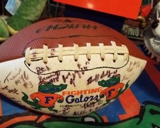 Gators team signed ball .