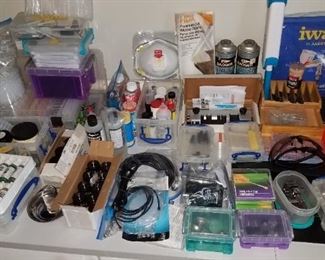 Three tables full of model building tools.