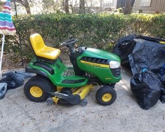 Clean, John Deere riding tractor / lawn mower with accessories. 104  hours, new battery.  Available for pre-sale @ $475.00