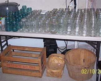 Canning items including jars, wood crate and baskets